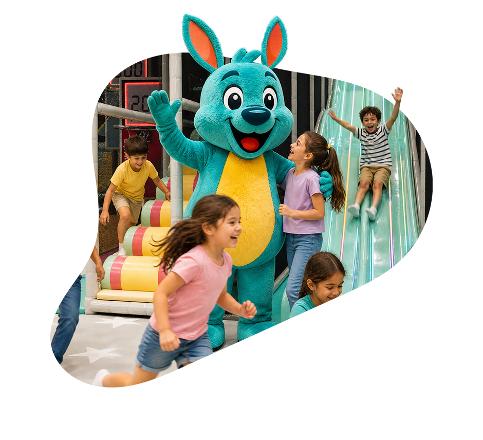 Children having fun with the playtropolis mascot at the indoor playground in woodbridge near vaughan